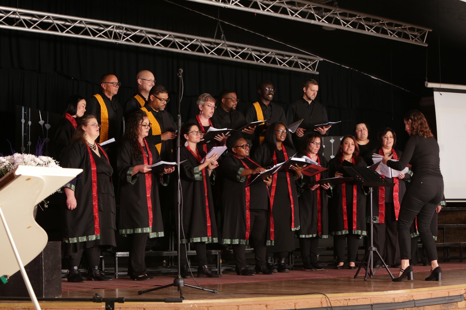 Voces Libres choir members in concert